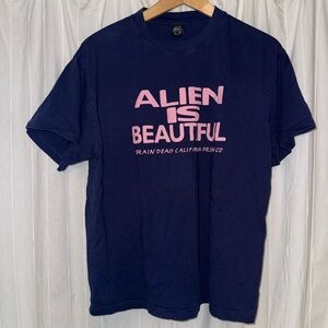 Brain Dead Navy Tee with Pink "Alien Is Beautiful" Graphic